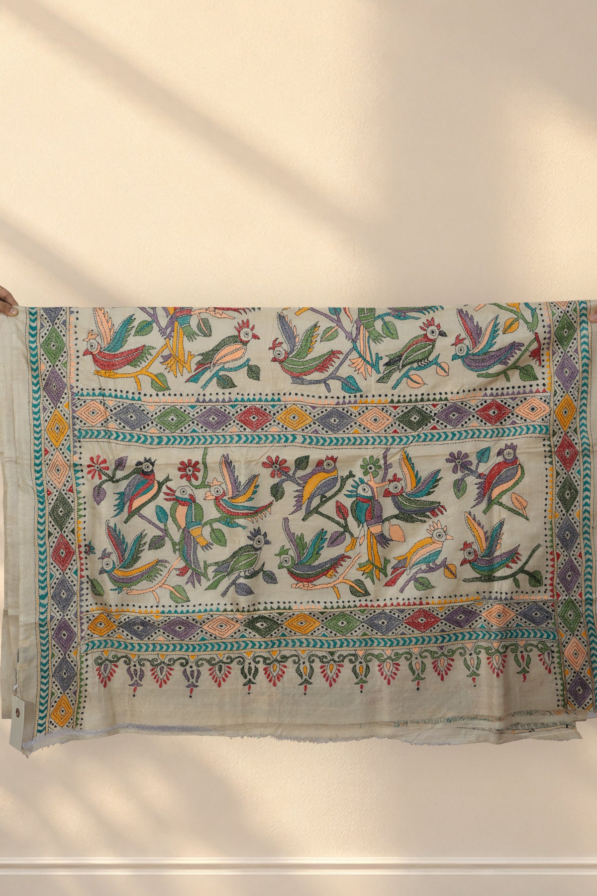 Multicolour geometric diamond skirt border on Tiya Bon Kantha Tussar saree