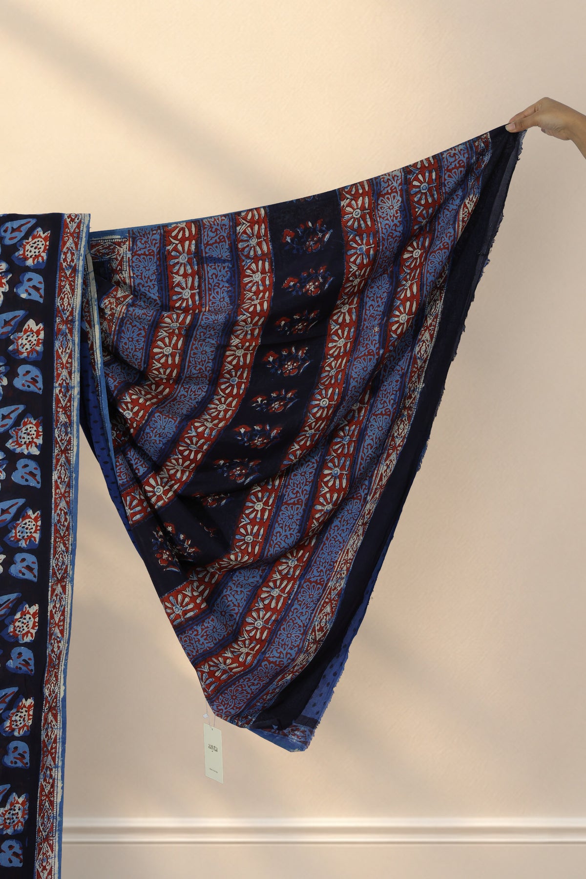 Abstract floral printed pallu of Kaali Bel black Bagru Habutai silk saree
