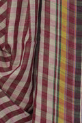 Close up of pink and white checks on handwoven Bhujodi Tussar silk