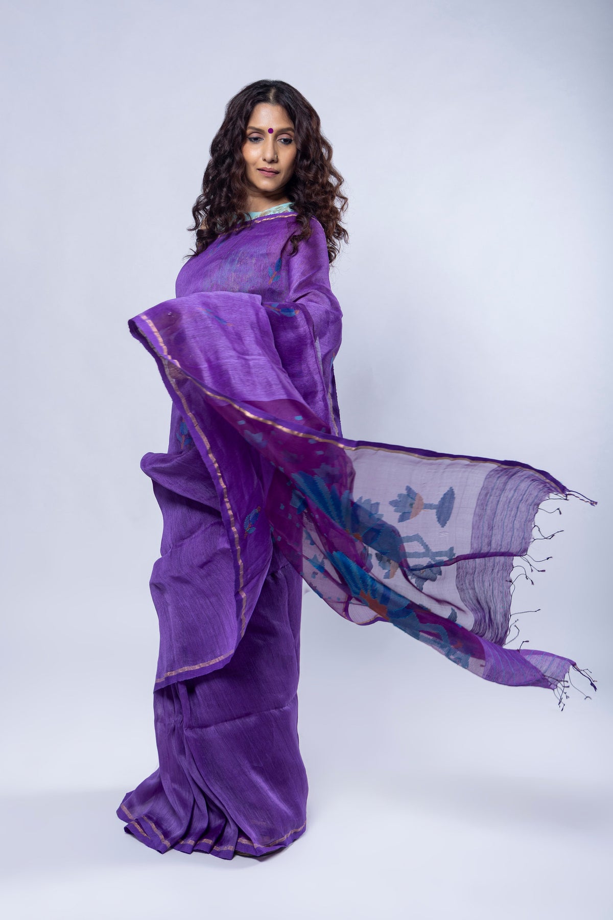 Beguni Moyur purple silk linen saree with needle Jamdani motifs and peacock pallu