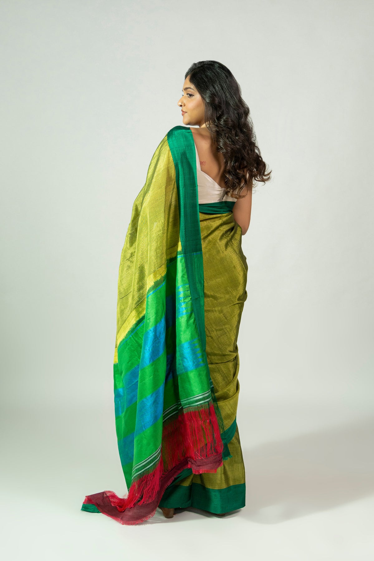 Ele Hasiru saree showing green body and woven border