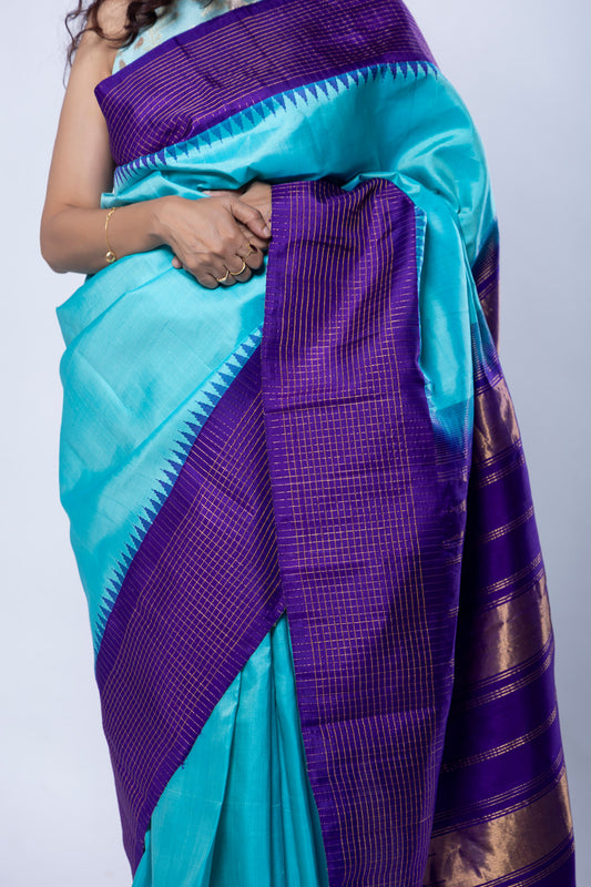 Teal blue Molakalmuru silk saree with purple and gold zari checks