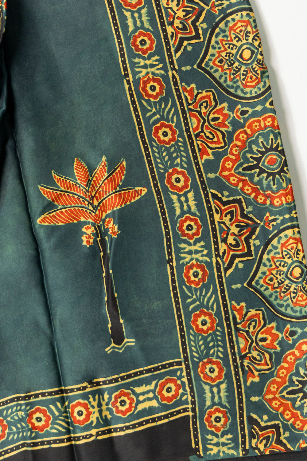 Khajuri Baag Ajrakh modal saree with black selvedge and floral border