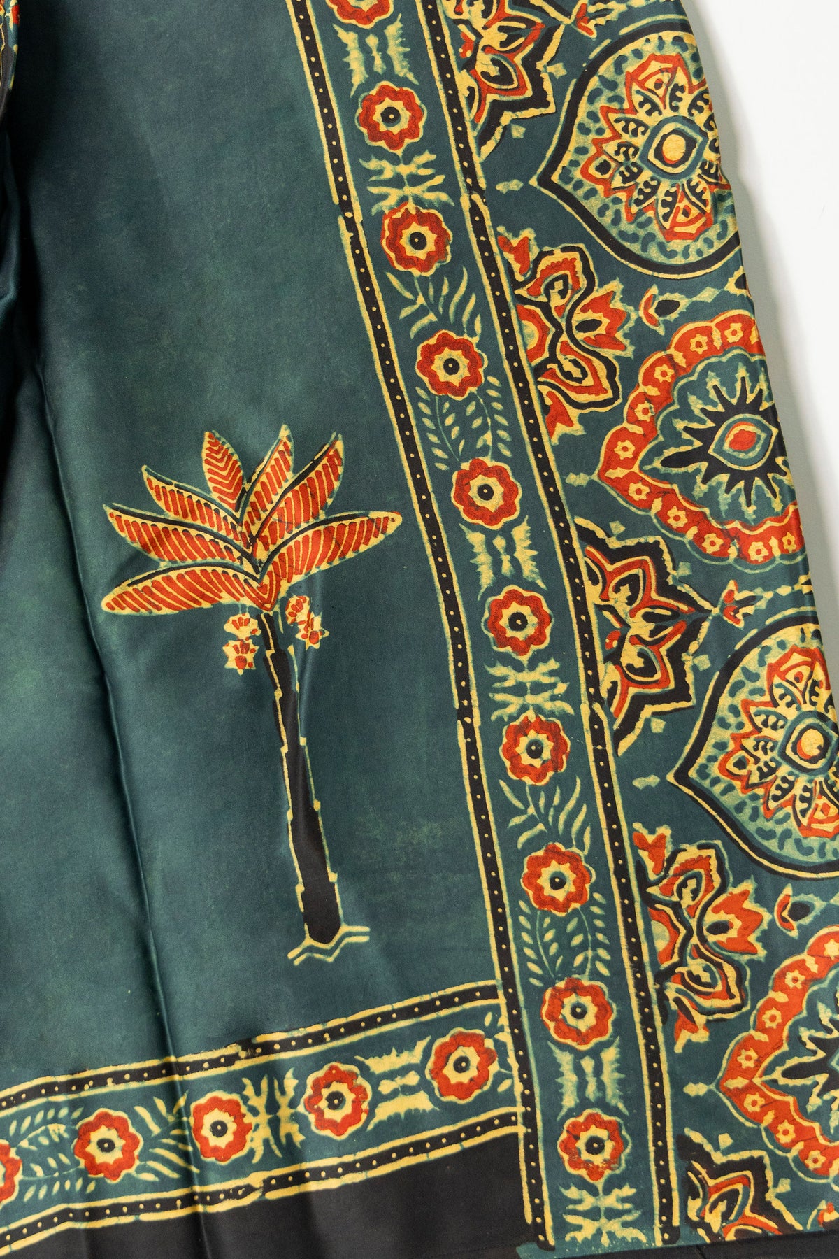 Khajuri Baag Ajrakh modal saree with black selvedge and floral border