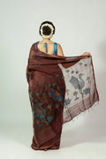 Blue peacock and lotus needle Jamdani pallu on Padma Raat silk linen saree