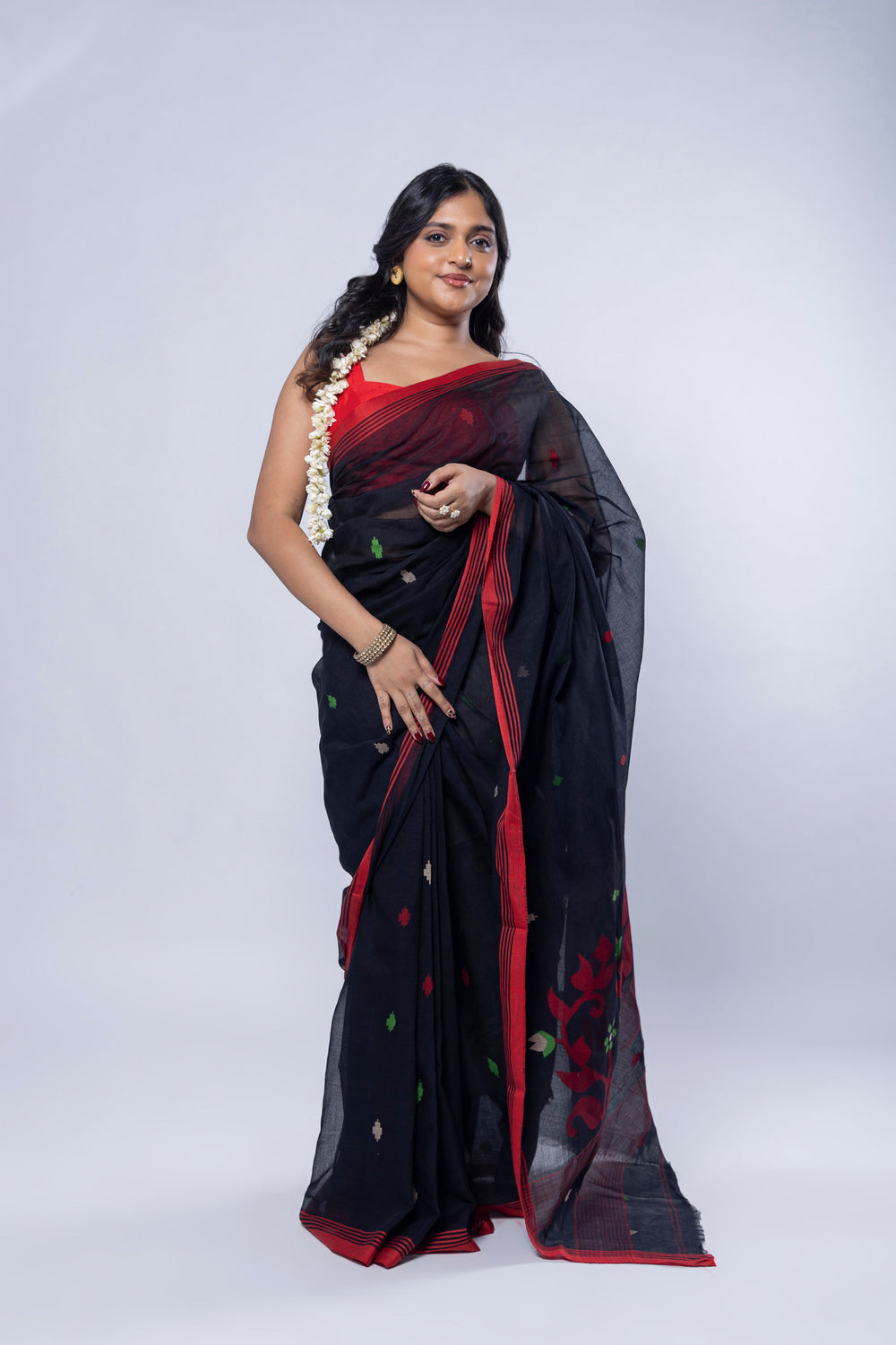 Raat Palash black Jamdani cotton saree with red border and abstract motifs
