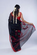 Raat Palash Jamdani saree showing black body and red border