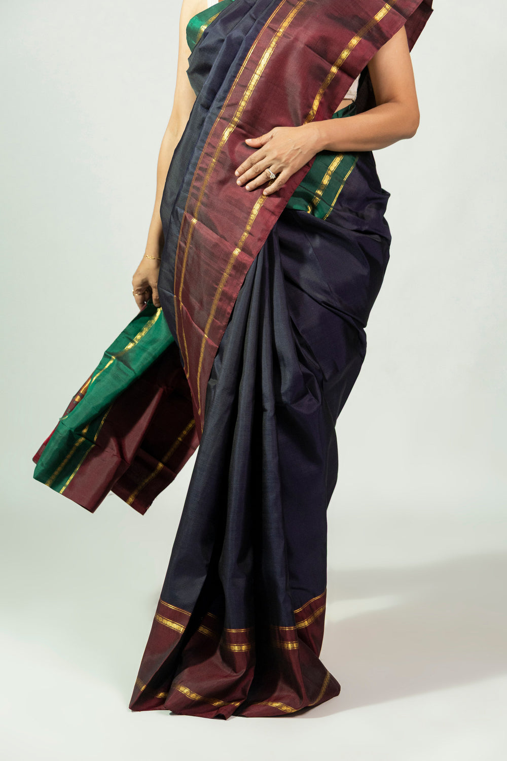 Deep navy Molakalmuru silk saree with red border