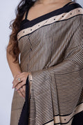 Red blue and black round print pallu of Safed Rann Ajrakh saree