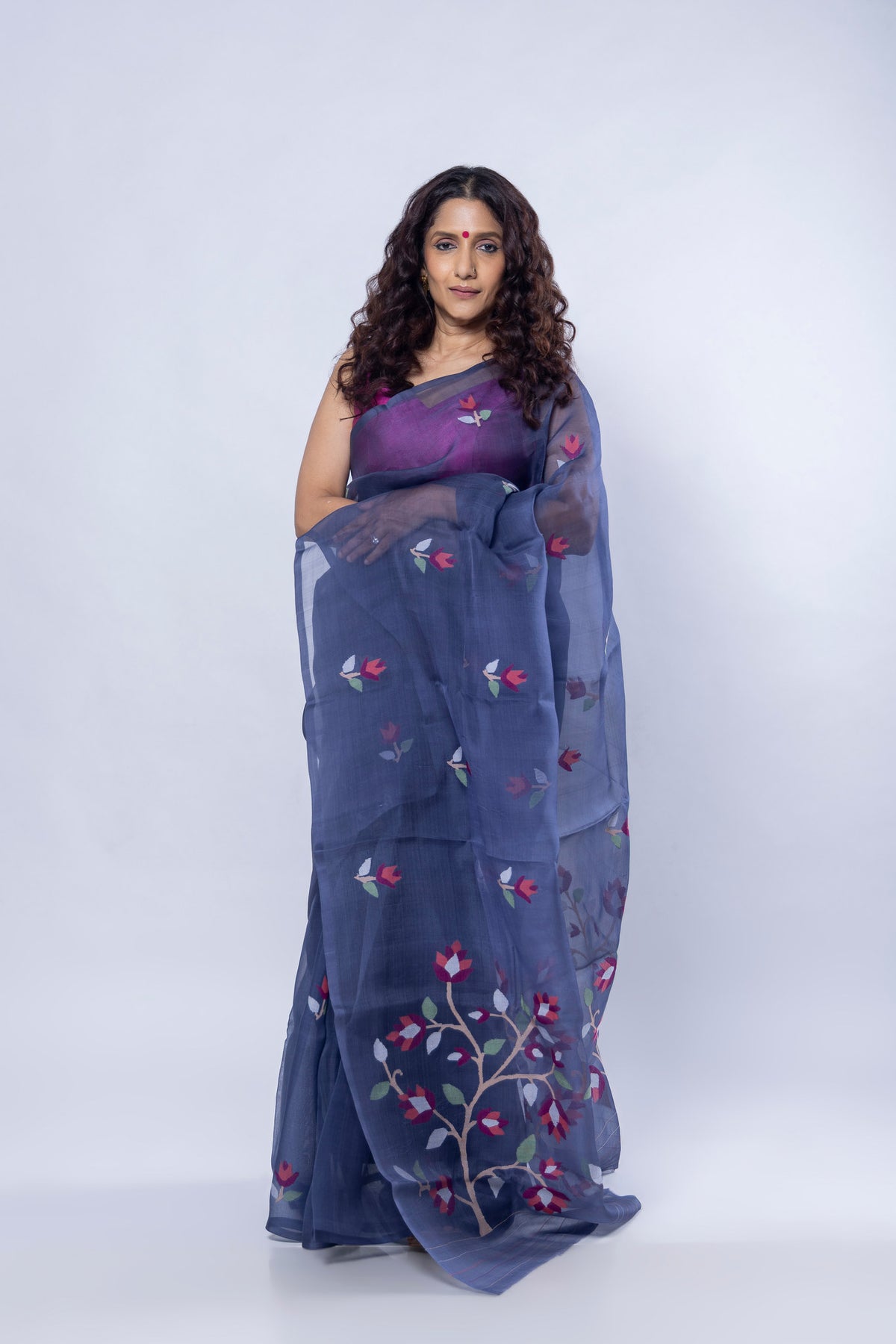 Handwoven Jamdani cotton saree with traditional motifs