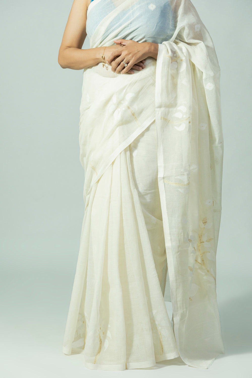 Ivory Jamdani cotton saree with handwoven palm tree border motifs